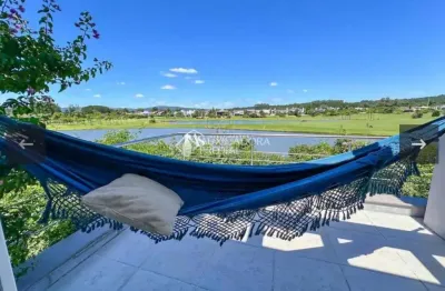 Casa em condomínio fechado com 3 quartos à venda na avenida juca batista, 9000, belém novo, porto alegre, 297 m2 por r$ 2.200.000