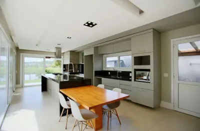 Casa em condomínio fechado com 3 quartos à venda na avenida juca batista, 9000, belém novo, porto alegre, 297 m2 por r$ 2.200.000