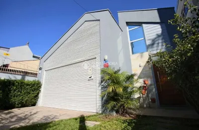 Casa em condomínio fechado com 3 quartos à venda na rua doutor gastão rhodes, 377, santana, porto alegre, 233 m2 por r$ 1.690.000