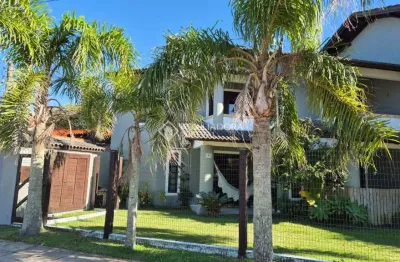 Casa em condomínio fechado com 4 quartos à venda na das camélias, 927, noiva do mar, xangri-lá, 120 m2 por r$ 590.000
