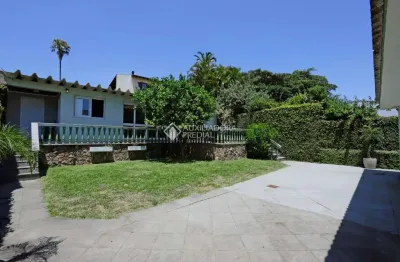 Casa com 4 quartos à venda na Rua Alfredo Schuett, 823, Três Figueiras, Porto Alegre, 390 m2 por R$ 2.600.000