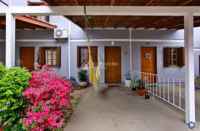 Casa em condomínio fechado com 2 quartos à venda na avenida otto niemeyer, 2417, tristeza, porto alegre, 94 m2 por r$ 380.000