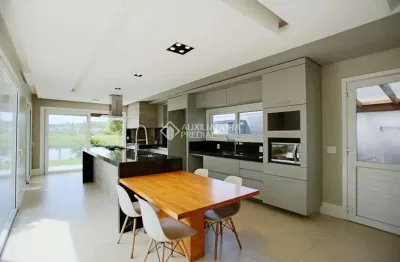 Casa em condomínio fechado com 3 quartos para alugar na avenida juca batista, 9000, belém novo, porto alegre, 297 m2 por r$ 9.900