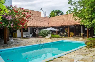 Casa em condomínio fechado com 6 quartos à venda na avenida da cavalhada, 5205, cavalhada, porto alegre, 701 m2 por r$ 4.000.000