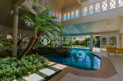 Casa em condomínio fechado com 4 quartos à venda na avenida da cavalhada, 5205, cavalhada, porto alegre, 927 m2 por r$ 6.000.000