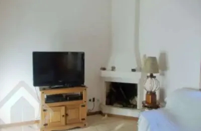 Casa em condomínio fechado com 3 quartos à venda na rua isidoro bettio, 90, hípica, porto alegre, 69 m2 por r$ 300.800