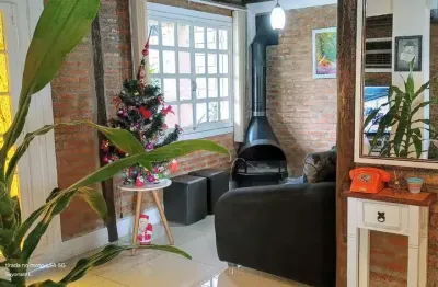 Casa em condomínio fechado com 4 quartos à venda na rua mogno, 24, cantegril, viamão, 190 m2 por r$ 550.000