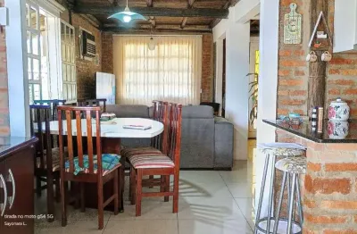 Casa em condomínio fechado com 4 quartos à venda na Rua Isabel Bastos, 24, Cantegril, Viamão, 190 m2 por R$ 550.000