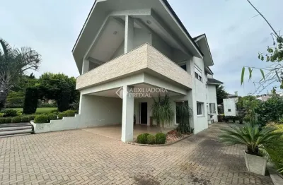 Casa em condomínio fechado com 3 quartos à venda na estrada capitão gentil machado de godoy, 4500, vila elsa, viamão, 357 m2 por r$ 1.620.000
