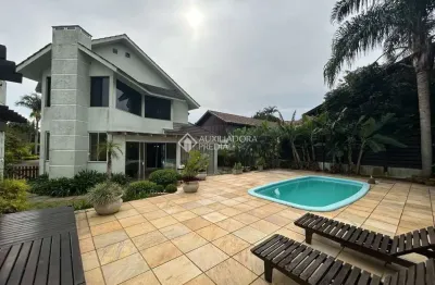 Casa em condomínio fechado com 3 quartos à venda na estrada capitão gentil machado de godoy, 4500, vila elsa, viamão, 357 m2 por r$ 1.490.000