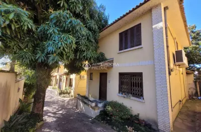 Casa em condomínio fechado com 3 quartos à venda na rua doutor barcelos, 1813, tristeza, porto alegre, 141 m2 por r$ 600.000