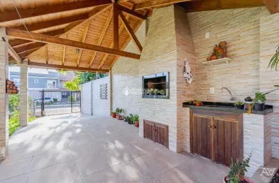 Casa com 4 quartos à venda na avenida doutor severo da silva, 497, estância velha, canoas, 240 m2 por r$ 1.050.000