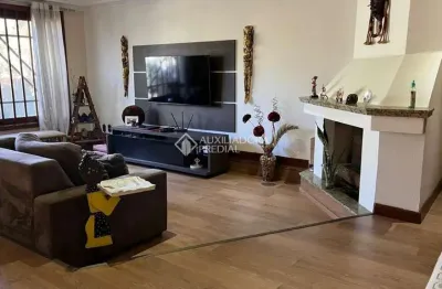 Casa com 3 quartos à venda na rua tenente antônio joão, 228, estância velha, canoas, 307 m2 por r$ 1.450.000