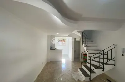 Casa em condomínio fechado com 2 quartos à venda na rua treze de maio, 630, rio branco, canoas, 106 m2 por r$ 277.000