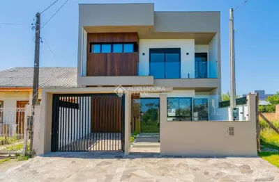 Casa com 5 quartos à venda na leonel de moura brizola, 71, harmonia, canoas, 215 m2 por r$ 1.260.000