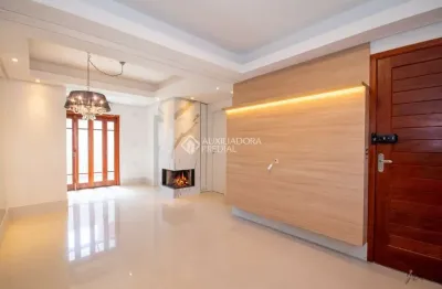 Casa em condomínio fechado com 3 quartos à venda na rua república, 2708, harmonia, canoas, 88 m2 por r$ 450.000