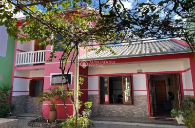 Casa com 2 quartos à venda na beco santa fé, 295, santa fé, gravataí, 153 m2 por r$ 800.000