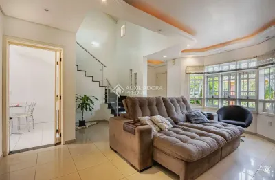 Casa em condomínio fechado com 4 quartos à venda na rua da alegria, 136, estância velha, canoas, 190 m2 por r$ 949.000