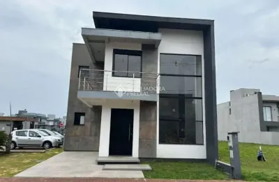Casa em condomínio fechado com 3 quartos à venda na rua das cerejeiras, 43, parque da matriz, gravataí, 139 m2 por r$ 959.900