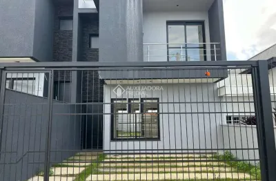 Casa com 3 quartos à venda na rubem fonseca vargas, 120, dom feliciano, gravataí, 100 m2 por r$ 589.900