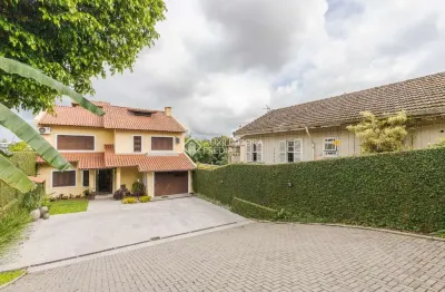 Casa com 3 quartos à venda na rua clemente pinto, 103, nossa senhora das graças, canoas, 320 m2 por r$ 1.800.000
