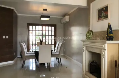 Casa em condomínio fechado com 4 quartos à venda na rua capistrano de abreu, 771, niterói, canoas, 489 m2 por r$ 1.160.000