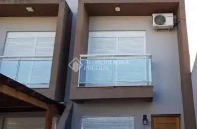 Casa em condomínio fechado com 2 quartos à venda na rua jardim américa, 222, harmonia, canoas, 76 m2 por r$ 415.000