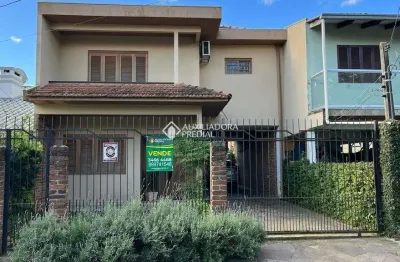 Casa em condomínio fechado com 3 quartos à venda na rua felipe de oliveira, 85, harmonia, canoas, 176 m2 por r$ 399.000