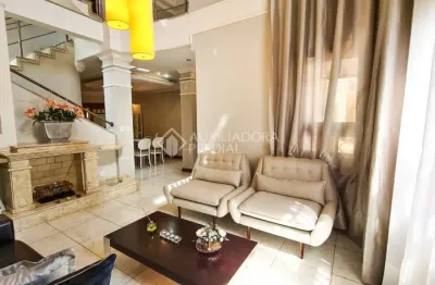 Casa em condomínio fechado com 5 quartos à venda na avenida farroupilha, 4201, marechal rondon, canoas, 308 m2 por r$ 3.007.000