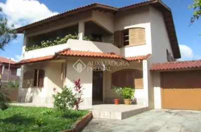 Casa em condomínio fechado com 3 quartos à venda na rua tamoio, 2292, niterói, canoas, 240 m2 por r$ 950.000