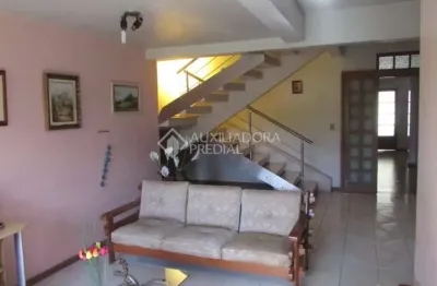 Casa em condomínio fechado com 3 quartos à venda na rua tamoio, 2292, niterói, canoas, 240 m2 por r$ 950.000