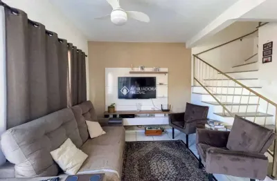 Casa em condomínio fechado com 2 quartos à venda na rua cidade de santa-fé, 20, mato grande, canoas, 63 m2 por r$ 295.000