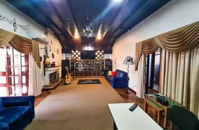 Casa em condomínio fechado com 4 quartos à venda na rua alpina, 38, estância velha, canoas, 420 m2 por r$ 1.999.000