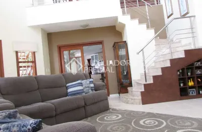 Casa em condomínio fechado com 3 quartos à venda na rua país de gales, 455, marechal rondon, canoas, 304 m2 por r$ 2.299.000