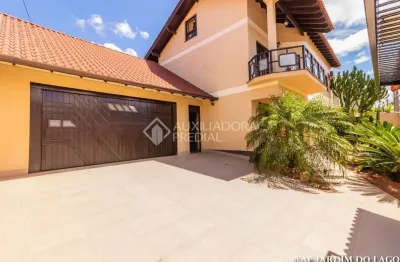 Casa em condomínio fechado com 3 quartos à venda na rua taurus, 198, moinhos de vento, canoas, 350 m2 por r$ 1.598.000