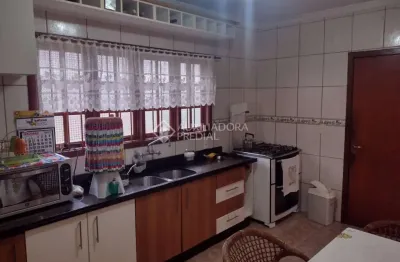 Casa em condomínio fechado com 3 quartos à venda na avenida doutor sezefredo azambuja vieira, 2553, estância velha, canoas, 185 m2 por r$ 1.275.000