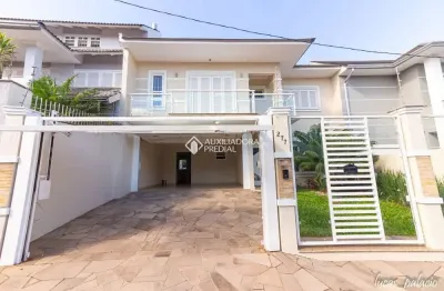 Casa com 4 quartos à venda na rua taurus, 277, estância velha, canoas, 206 m2 por r$ 1.400.000