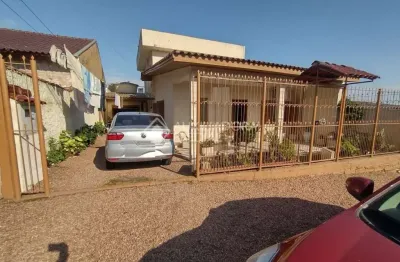 Casa com 3 quartos à venda na cento e doze, 6, guajuviras, canoas, 120 m2 por r$ 400.000