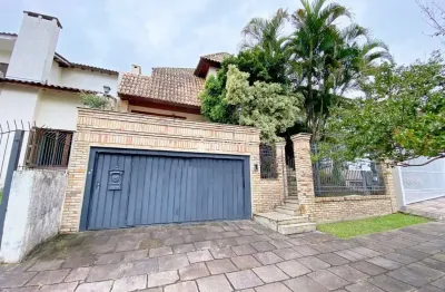 Casa com 4 quartos à venda na rua comendador creidy, 77, chácara das pedras, porto alegre, 400 m2 por r$ 1.400.000