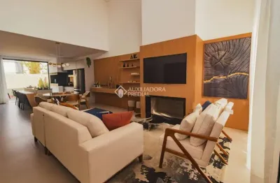 Casa em condomínio fechado com 4 quartos à venda na rua rio camisas, 101, centro, xangri-lá, 169 m2 por r$ 1.865.000