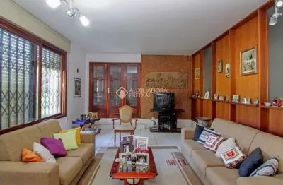 Casa com 3 quartos à venda na rua professor pedro santa helena, 556, jardim do salso, porto alegre, 202 m2 por r$ 800.000