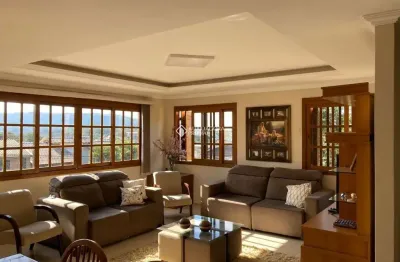 Casa com 4 quartos à venda na rua dolores duran, 2306, lomba do pinheiro, porto alegre, 234 m2 por r$ 640.000