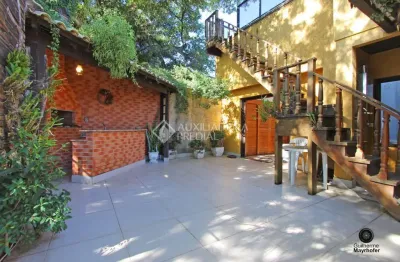 Casa em condomínio fechado com 4 quartos à venda na avenida juca batista, 1490, cavalhada, porto alegre, 400 m2 por r$ 1.490.000