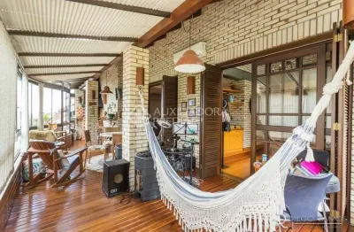 Casa em condomínio fechado com 4 quartos à venda na rua erechim, 100, nonoai, porto alegre, 331 m2 por r$ 1.050.000