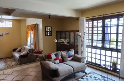 Casa com 3 quartos à venda na rua itaboraí, 1335, jardim botânico, porto alegre, 266 m2 por r$ 1.600.000