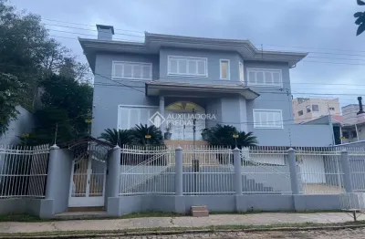 Casa com 5 quartos à venda na rua theonila carvalho da motta, 184, parque santa fé, porto alegre, 650 m2 por r$ 1.250.000