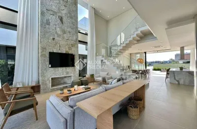 Casa em condomínio fechado com 5 quartos à venda na rua rio jacuí, 1244, centro, xangri-lá, 430 m2 por r$ 5.850.000