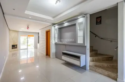 Casa em condomínio fechado com 2 quartos à venda na Rua Silvino Nedel, 110, Mário Quintana, Porto Alegre, 170 m2 por R$ 499.000