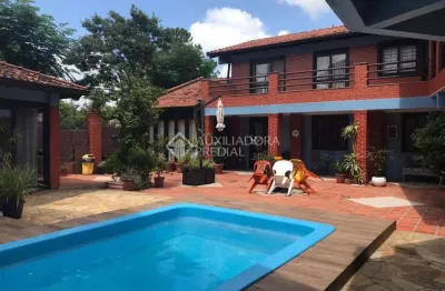 Casa em condomínio fechado com 4 quartos à venda na rua walter kaufmann, 6, jardim itu sabará, porto alegre, 357 m2 por r$ 1.600.000