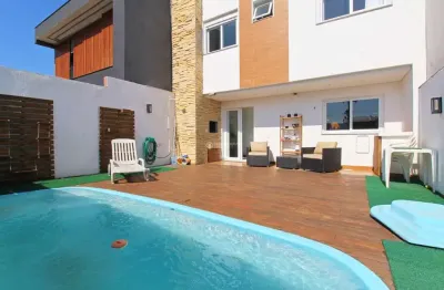 Casa em condomínio fechado com 3 quartos à venda na rua adalberto severo de moraes, 152, passo das pedras, porto alegre, 174 m2 por r$ 885.000